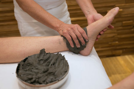 Applicazione fango articolazioni